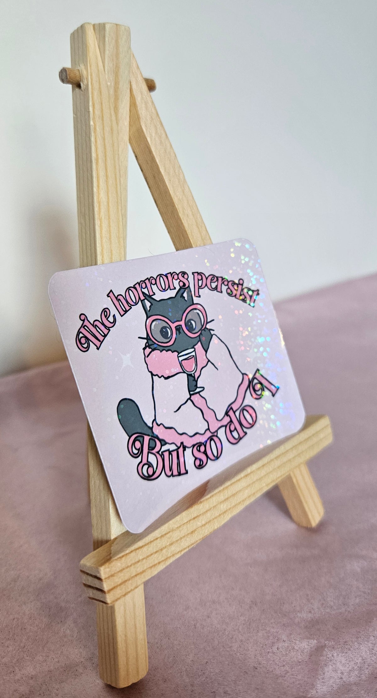'The Horrors Persist But So Do I' Holographic Sticker