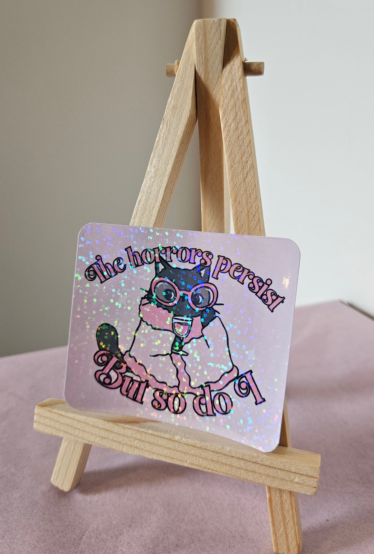 'The Horrors Persist But So Do I' Holographic Sticker